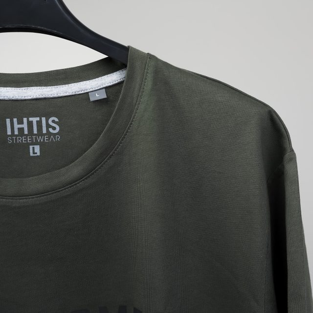In color Dark Khaki, this piece from our "Alpha & Omega" collection reflects a faith that’s bold and unshakable. Stand firm, live purposefully.